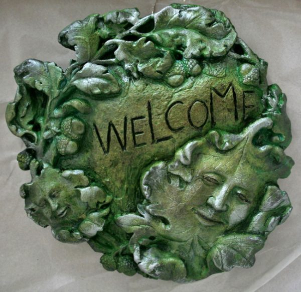green-man-welcome-plaque