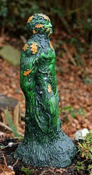 green-man-statue-side-view